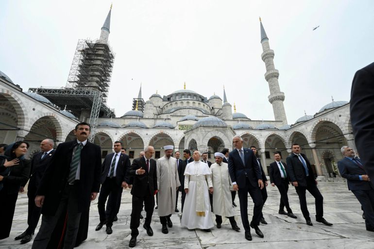 epa_692b02cb099f-1764426443 epa12556535 A handout picture provided by the Vatican Media shows Pope Leo XIV (C) during a visit to the Sultan Ahmed Mosque (The Blue Mosque) in Istanbul, Turkey, 29 November 2025. Pope Leo XIV is on his first apostolic journey outside Italy since his election as pontiff, visiting Turkey and Lebanon from 27 November to 02 December. EPA/VATICAN MEDIA HANDOUT HANDOUT EDITORIAL USE ONLY/NO SALES