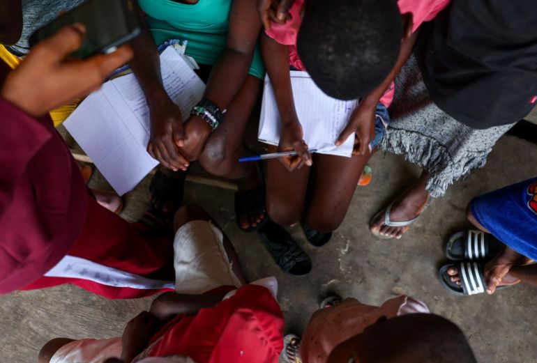nigeria-1763032685 Children affected by witchcraft stigmatisation work on a school assignment at the Child's Rights and Rehabilitation Network (CRARN) home in Eket, Akwa Ibom state, Nigeria, October 16, 2025. REUTERS/Sodiq Adelakun