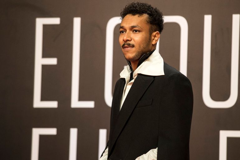 rapp-1763318024 Egyptian rapper Ahmad Ali, known as Wegz poses on the red carpet during the closing session of the 5th edition of the Gouna Film Festival in Egypt's Red Sea resort of el-Gouna, on October 22, 2021. (Photo by Khaled DESOUKI / AFP)