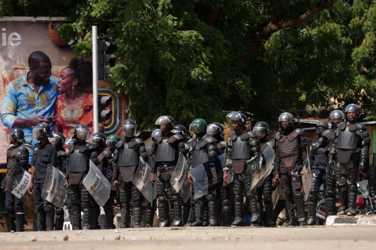 reuters_69028dc2-1761775042 Riot police officers stand guard amid violent protests, as Cameroonian opposition leaders have alleged fraud in the presidential election and rejected results, which gave victory to the ruling President Paul Biya, in Garoua, Cameroon, October 28, 2025. REUTERS/Desire Danga Essigue