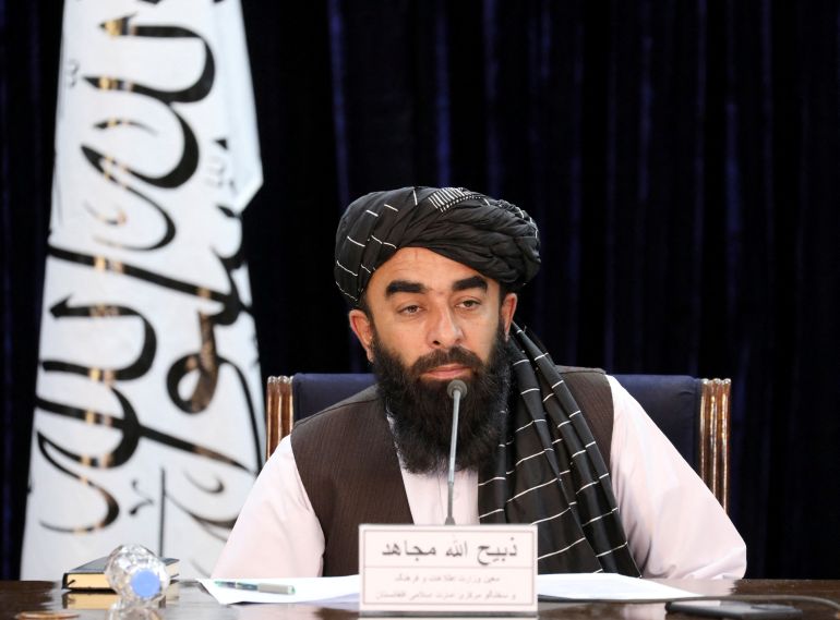 FILE PHOTO: Taliban spokesman Zabihullah Mujahid speaks during a news conference in Kabul, Afghanistan November 10, 2021. REUTERS/Ali Khara/File Photo