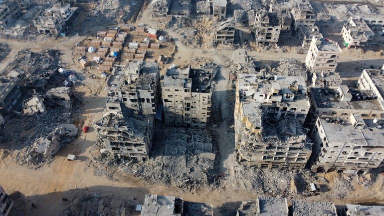 reuters_69072b15-1762077461 A drone view shows the destruction in a residential neighborhood, after the withdrawal of the Israeli forces from the area, amid a ceasefire between Israel and Hamas in Gaza, in Gaza City, October 24, 2025. REUTERS/Dawoud Abu Alkas