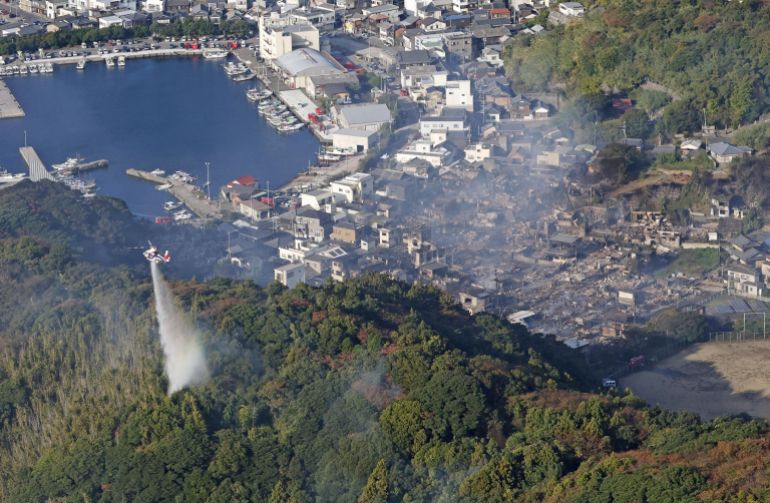 reuters_691d740f-1763537935 Smoke rises from the site where a massive fire blazed through more than 170 buildings, as seen from a helicopter, in Oita, Oita Prefecture, southwestern Japan, November 19, 2025, in this photo taken by Kyodo. Mandatory credit Kyodo/via REUTERS ATTENTION EDITORS - THIS IMAGE HAS BEEN SUPPLIED BY A THIRD PARTY. MANDATORY CREDIT. JAPAN OUT. NO COMMERCIAL OR EDITORIAL SALES IN JAPAN. TPX IMAGES OF THE DAY