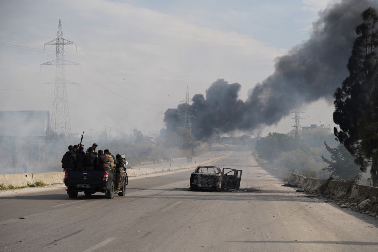 ss-1763457564 Black smoke rises as authorities extended the curfew in the cities of Latakia and Tartus in northwest Syria on Friday and launched large-scale security sweeps in urban centers, villages, and surrounding mountains to track down remnants of the deposed Bashar al-Assad regime on March 07, 2025 in Latakia, Syria (AA Photo)