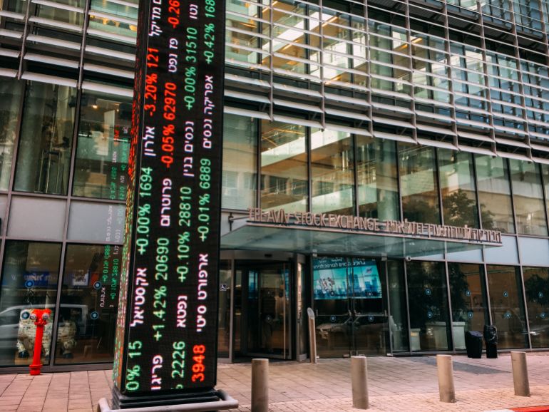 1tel-aviv-stock-1765997953 Tel Aviv, Israel - December 4, 2016: Tel Aviv Stock Exchange plays a major role in the Israeli economy. TASE lists some 473 companies, about 47 of which are also listed on stock exchanges in other countries.