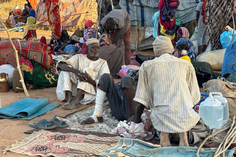 2asdasdasx-1761914365 Displaced Sudanese who fled El-Fasher after the city fell to the Rapid Support Forces (RSF), rest near the town of Tawila in war-torn Sudan's western Darfur region on October 28, 2025. Fears mounted in Sudan on October 28, three days after paramilitaries seized the key city of El-Fasher, amid reports of mass atrocities and the killing of five Red Crescent volunteers in Kordofan. The capture of El-Fasher, the historic heart of Darfur, has sparked fears of mass killings reminiscent of the regions darkest days. (Photo by AFP)