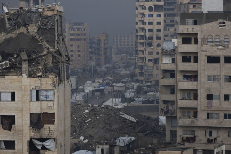 39-1-1765872231 GAZA CITY, GAZA - DECEMBER 15: Palestinians displaced by Israeli attacks struggle to carry out their daily lives under harsh conditions in makeshift tents in Gaza City, Gaza on December 15, 2025. Heavy rainfall and strong storms affect the Gaza Port area in western Gaza City, damaging tents where displaced Palestinians take shelter. Adverse weather conditions further exacerbate the hardships faced by displaced Palestinians living under severe humanitarian conditions. ( Mahmoud Abu Hamda - Anadolu Agency )