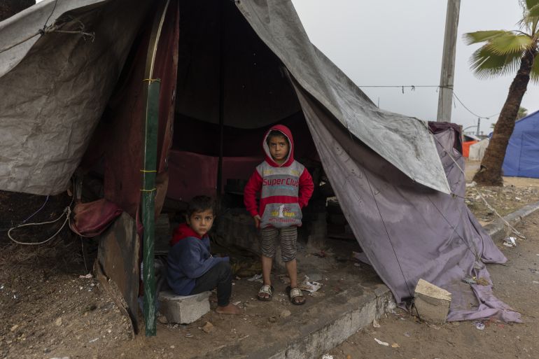 54-13-1765871184 GAZA CITY, GAZA - DECEMBER 15: Palestinians displaced by Israeli attacks struggle to carry out their daily lives under harsh conditions in makeshift tents in Gaza City, Gaza on December 15, 2025. Heavy rainfall and strong storms affect the Gaza Port area in western Gaza City, damaging tents where displaced Palestinians take shelter. Adverse weather conditions further exacerbate the hardships faced by displaced Palestinians living under severe humanitarian conditions. ( Mahmoud Abu Hamda - Anadolu Agency )