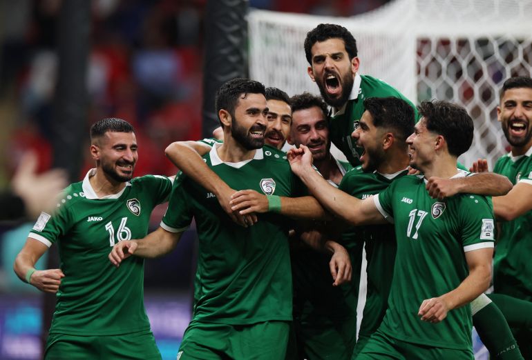 54-8-1764666481 Soccer Football - FIFA Arab Cup - Qatar 2025 - Group A - Tunisia v Syria - Ahmad bin Ali Stadium, Al Rayyan, Qatar - December 1, 2025 Syria's Omar Maher Khribin celebrates scoring their first goal with teammates REUTERS/Ibraheem Al Omari