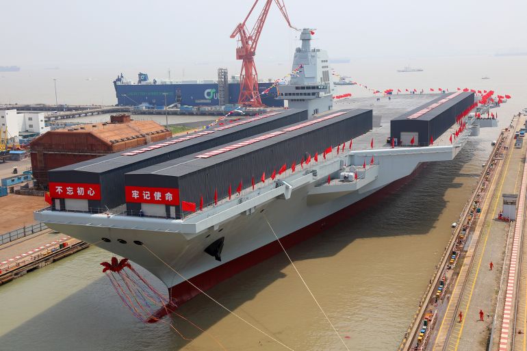 SHANGHAI, CHINA - JUNE 17: General view of the launching ceremony of China's third aircraft carrier, the Fujian, named after Fujian Province, at Jiangnan Shipyard, a subsidiary of China State Shipbuilding Corporation (CSSC), on June 17, 2022 in Shanghai, China. (Photo by Li Tang/VCG via Getty Images)