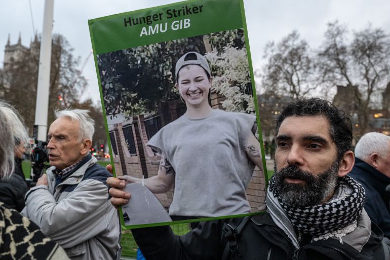 78798465-1766224977 LONDON, ENGLAND - DECEMBER 15: Supporters of the Palestine Action hunger strikers protest in Parliament square while waiting for the Derry delegation on December 15, 2025 in London, England. Demonstrators are gathering to greet a delegation from Derry City and Strabane District Council who are meeting with families of Palestine Action (PA) prisoners on hunger strike. Last month the council in Northern Ireland voted to pass a motion in solidarity with the group of PA prisoners who have gone on hunger strike to demand for the closure of Elbit Systems sites in the UK, the lifting of the government's proscription against Palestine Action, and the right to fair trials. (Photo by Guy Smallman/Getty Images)