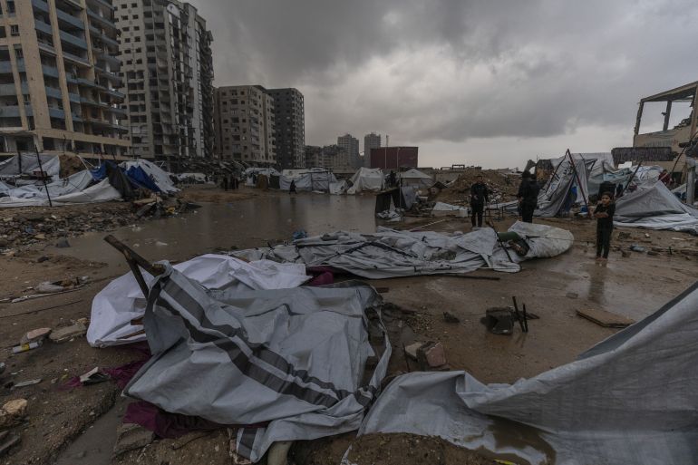 87-16-1765870190 GAZA CITY, GAZA - DECEMBER 15: Palestinians displaced by Israeli attacks struggle to carry out their daily lives under harsh conditions in makeshift tents in Gaza City, Gaza on December 15, 2025. Heavy rainfall and strong storms affect the Gaza Port area in western Gaza City, damaging tents where displaced Palestinians take shelter. Adverse weather conditions further exacerbate the hardships faced by displaced Palestinians living under severe humanitarian conditions. ( Mahmoud Abu Hamda - Anadolu Agency )