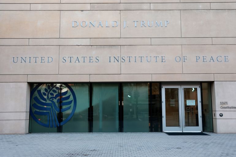afp_693113c2781d-1764824002 WASHINGTON, DC - DECEMBER 03: U.S. President Donald Trump's name is seen recently placed on the outside of the United States Institute of Peace (USIP) building headquarters on December 03, 2025 in Washington, DC. This addition was made ahead of the Trump administration hosting a deal-signing between the leaders of Rwanda and the Democratic Republic of Congo. Anna Moneymaker/Getty Images/AFP (Photo by Anna Moneymaker / GETTY IMAGES NORTH AMERICA / Getty Images via AFP)