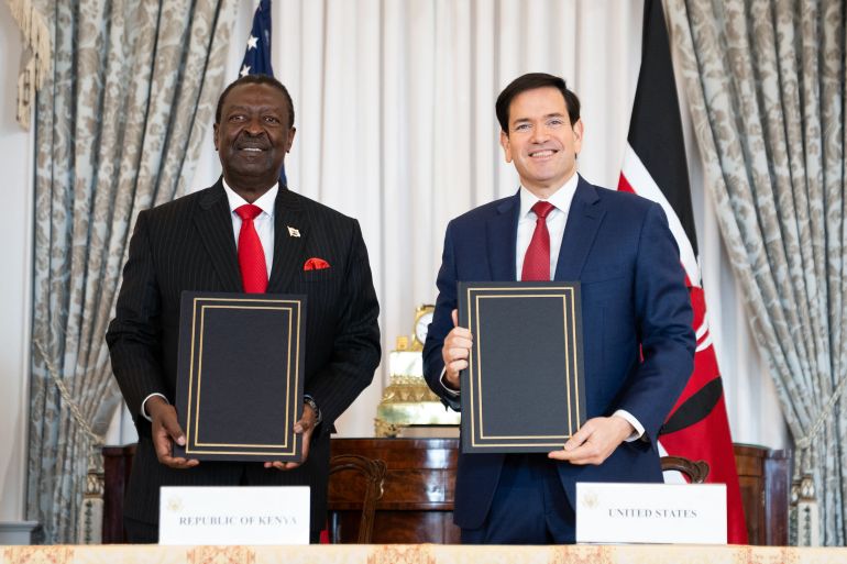 afp_693bbdf8b012-1765522936-1 US Secretary of State Marco Rubio (R) and Kenyan Prime Cabinet Secretary Musalia Mudavadi (L) participate in a Health Framework of Cooperation signing ceremony at the State Department in Washington, DC on December 4, 2025.