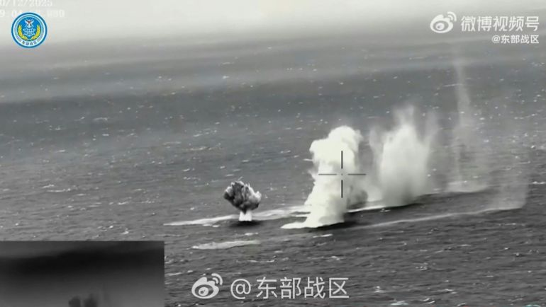 afp_6954b1db4ce0-1767158235 This frame grab from China's People's Liberation Army (PLA) Eastern Theater Command undated handout video footage released on December 30, 2025 via AFPTV shows rockets being fired into water in an undisclosed location.