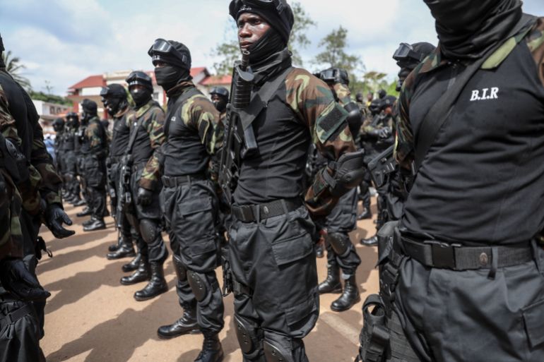 afpiversary-1714904040 Members of the Rapid Intervention Battalion (Bataillon d'Intervention Rapide, BIR), an elite military force and an army combat unit of the Cameroonian Armed Forces line up ahead of the May 20th parade marking the 51st celebration of Unity Day in Yaounde on May 20, 2023. The National Day of Cameroon, also known as Unity Day, celebrates the national referendum held on May 20, 1972, in which Cameroonians voted for a unitary state as opposed to the existing federal state. (Photo by AFP)