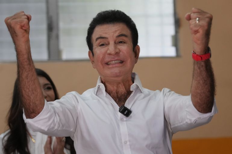 ap_692d57bda48c3-1764579261 Presidential candidate Salvador Nasralla, of the Liberal Party, celebrates after voting in general elections in Tegucigalpa, Honduras, Sunday, Nov. 30, 2025. (AP Photo/Moises Castillo)