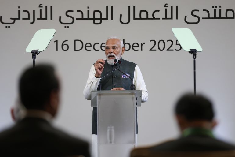 ap_69418211467eb-1765900817 India's Prime Minister Narendra Modi delivers a speech during the India Jordan Business Forum in Amman, Jordan, Tuesday, Dec. 16, 2025. (AP Photo/Raad Adayleh)