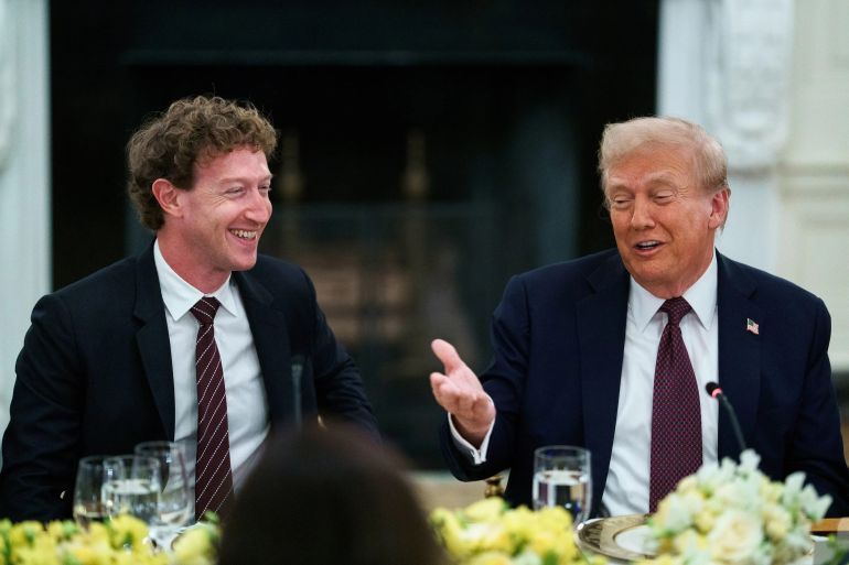 Mark Zuckerberg, chief executive officer of Meta Platforms Inc., left, and US President Donald Trump during a dinner with tech leaders in the State Dining Room of the White House in Washington, DC, US, on Thursday, Sept. 4, 2025. US President Donald Trump said he would be imposing tariffs on semiconductor imports "very shortly" but spare goods from companies like Apple Inc. that have pledged to boost their US investments. Photographer: Will Oliver/EPA/Bloomberg via Getty Images