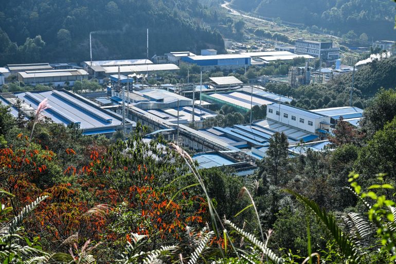 In this photo take on November 20, 2025, a view of a rare earths processing plant is seen in Dingnan County, Ganzhou, in eastern China's Jiangxi province . Buried in the reddish soil of southern China lies latent power: one of the largest clusters of crucial rare earths is mined around the clock by a secretive and heavily guarded industry. The hills of Jiangxi province are home to most of China's rare earth mines, with the materials used in products from smartphones to missile guidance technology. (Photo by Hector RETAMAL / AFP) / TO GO WITH 'CHINA-ECONOMY-POLITICS-TRADE-MINING, REPORTAGE' BY PETER CATTERALL