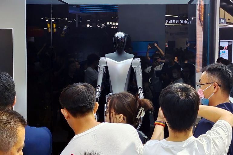 d98ad984d8a756-1762956873 Visitors are visiting the Tesla booth at the 2023 World Artificial Intelligence Conference in Shanghai, China, on July 6, 2023. (Photo by Costfoto/NurPhoto via Getty Images)