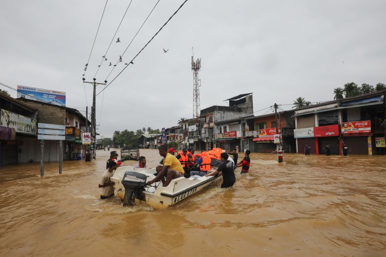 epa_692d7c8f3430-1764588687 epa12556552 Sri Lankan flood victims wade through a flooded road during heavy rainfall in a suburb of Colombo, Sri Lanka, 29 November 2025. Many parts of the island have been inundated due to heavy rains. According to Sri Lanka’s Disaster Management Centre, more than 120 people have been killed and about 130 are missing across the country. EPA/CHAMILA KARUNARATHNE