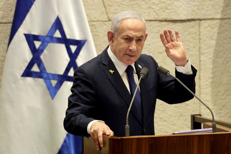 epa_692d7cee706a-1764588782 epa12516452 Israel's Prime Minister Benjamin Netanyahu speaks during a plenary session at the Knesset, the Israeli parliament in Jerusalem, 10 November 2025. The session has been initiated by the opposition demanding the establishment of a state inquiry conference to investigate the 07 October 2023 massacre. EPA/ABIR SULTAN