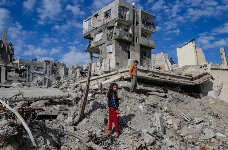 epa_692fea52d70b-1764747858 epa12565720 Palestinian children stand in the ruins of their families homes in Gaza City, Gaza Strip, 02 December 2025, amid a ceasefire between Israel and Hamas. Around 1.9 million people in Gaza, nearly 90 percent of the population, have been displaced since the Israel-Hamas conflict began in October 2023, according to the UN. EPA/MOHAMMED SABER