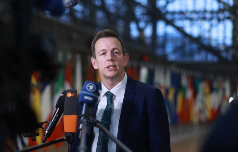 epa_6937dcfcc57f-1765268732 epa12578109 Danish Minister for Integration Rasmus Stoklund speaks to the press during a European Interior Ministers meeting in Brussels, Belgium, 08 December 2025. EU Home Affairs Ministers are working to finalize the first Annual Solidarity Pool (starting June 2026) under the Migration Pact, deciding on contributions (relocations/funds) from member states to support those under pressure, while also advancing new laws for faster asylum processing and returns, including mandatory border procedures for certain applicants and clear rules for safe countries, aiming for quicker decisions and increased return efficiency. EPA/OLIVIER HOSLET