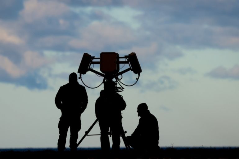 epa12540150 The crew of a radio detection intervention system during the NATO drone exercise 'Project Flytrap 4.5' near Oldenburg in Holstein, northern Germany, 21 November 2025. The technology demonstration, which runs from 10 to 21 November, tests ready-to-use counter-drone systems designed to accelerate solutions against rapidly evolving unmanned aerial system (UAS) threats for US and NATO forces. EPA/FILIP SINGER
