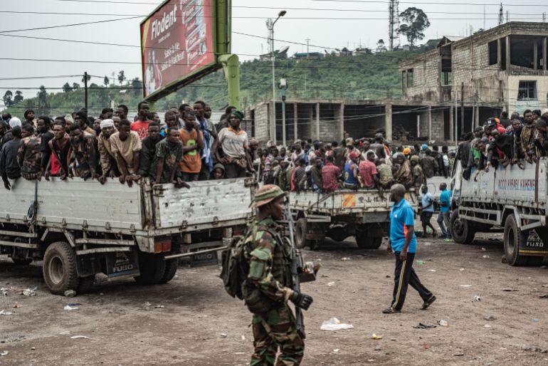 getty_686ecc8f49-1752091791 GOMA, DEMOCRATIC REPUBLIC OF CONGO - JANUARY 30: Men who are among the estimated 2400 Congolese (FARDC) soldiers who surrendered en masse to M23 rebels are loaded on to trucks to be taken to an unknown location from the Stade de l'Unite on January 30, 2025 in Goma, Democratic Republic of Congo. The Rwanda-backed M23 rebel group has seized control Goma, in Eastern Congo, and are reportedly advancing south. (Photo by Daniel Buuma/Getty Images)