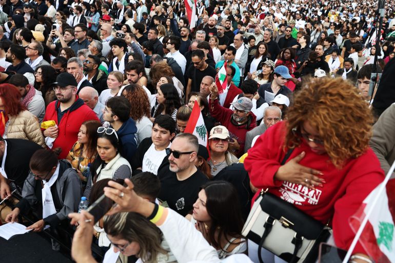 getty_692ebecc41-1764671180 BEIRUT, LEBANON - DECEMBER 2: Well wishers and members of the Catholic faith attend mass in the presence of Pope Leo XIV, on December 2, 2025 in Beirut, Lebanon. Pope Leo XIV is making his first foreign trip on a six-day visit to Turkey and Lebanon. During his trip, the Pope is scheduled to meet with faithful from local Catholic communities, as well as political and religious leaders, drawing attention to regional issues. (Photo by Chris McGrath/Getty Images)