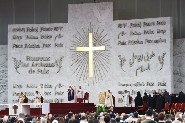 getty_692ebedc86-1764671196 BEIRUT, LEBANON - DECEMBER 2: Pope Leo XIV celebrates mass at the Beirut waterfront on December 2, 2025, in Beirut, Lebanon. Pope Leo XIV is making his first foreign trip on a six-day visit to Turkey and Lebanon. During his trip, the Pope is scheduled to meet with faithful from local Catholic communities, as well as political and religious leaders, drawing attention to regional issues. (Photo by Chris McGrath/Getty Images)