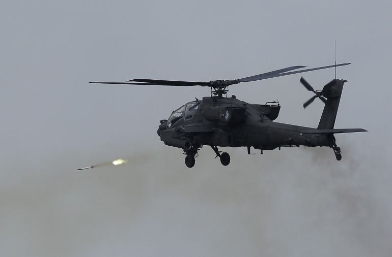 getty_694e4abc46-1766738620 POCHEON, SOUTH KOREA - AUGUST 28: An AH64 Apachi helicopter hovers during the South Korea and U.S. joint military exercise at the Seungjin firing drill ground on August 28, 2015 in Pocheon, South Korea. South Korea and U.S. military held a joint live fire military exercise at the Seungjin firing drill ground. The exercise is intended to prepare the South Korean defense force amid the tension with North Korea. (Photo by Chung Sung-Jun/Getty Images)