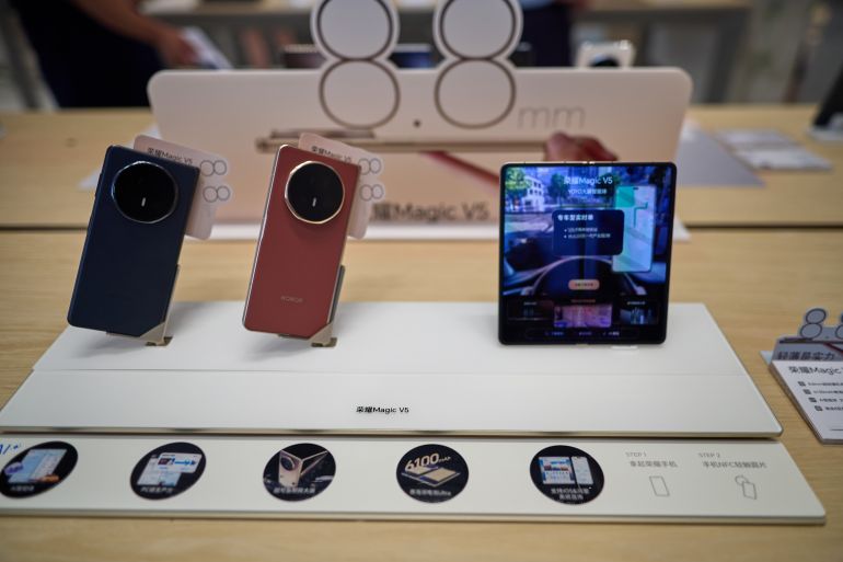 SHAOXING, CHINA - JULY 02: Honor Magic V5 foldable smartphones are on sale at a store on July 2, 2025 in Shaoxing, Zhejiang Province of China. (Photo by VCG/VCG via Getty Images)
