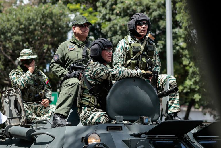 gettyimages-2236007514-1765013037-1 CARACAS, VENEZUELA - SEPTEMBER 21: The Venezuelan Armed Forces and army tanks drive along a highway during a military exercise in Caracas, Venezuela on September 20, 2025. (Photo by Ivan McGregor/Anadolu via Getty Images)