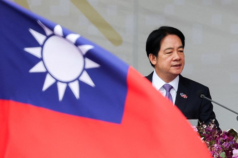Taiwan President Lai Ching-te gives a keynote address on national day to mark the 113th birthday of the Republic of China, Taiwan's formal name, in Taipei, Taiwan October 10, 2024. REUTERS/Ann Wang TPX IMAGES OF THE DAY