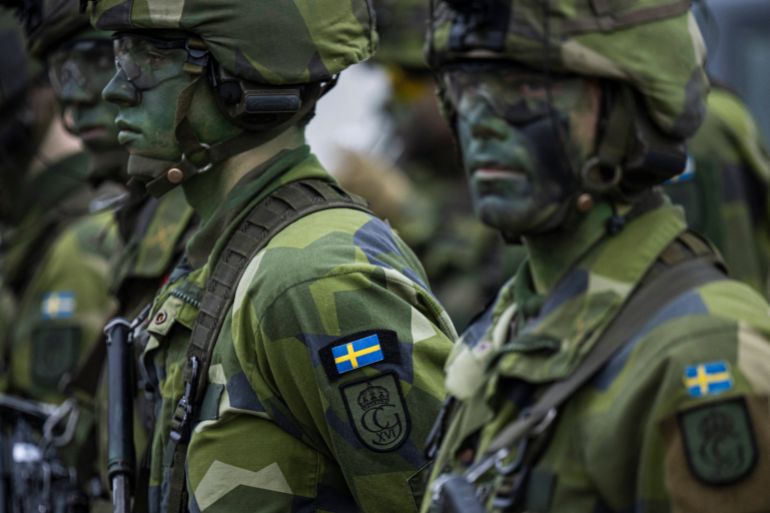 qwqweqwd5-1751371689 Soldiers from the 13th counter intelligence battalion, 2nd reconnaissance platoon of the Swedish Armed Forces, participate in military exercise in Kungsangen, near Stockholm on February 27, 2024. (Photo by Jonathan NACKSTRAND / AFP)