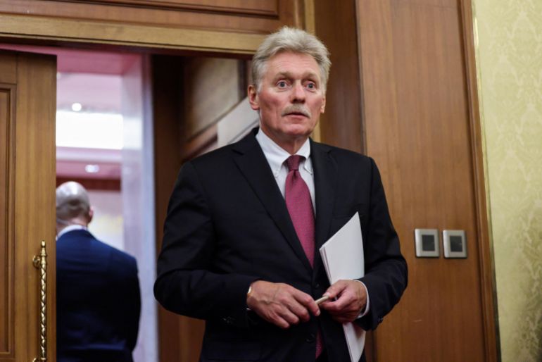 reuters_68d3b124-1758703909 Kremlin spokesman Dmitry Peskov walks at Diaoyutai State Guesthouse in Beijing, China, September 2, 2025. REUTERS/Maxim Shemetov/Pool