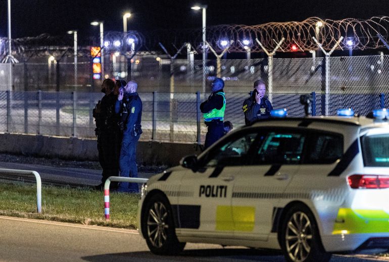 reuters_68d7ba0a-1758968330 FILE PHOTO: Police officers stand guard after all traffic has been closed at the Copenhagen Airport due to drone reports in Copenhagen, Denmark September 22, 2025. Ritzau Scanpix/Steven Knap via REUTERS ATTENTION EDITORS - THIS IMAGE WAS PROVIDED BY A THIRD PARTY. DENMARK OUT. NO COMMERCIAL OR EDITORIAL SALES IN DENMARK./File Photo
