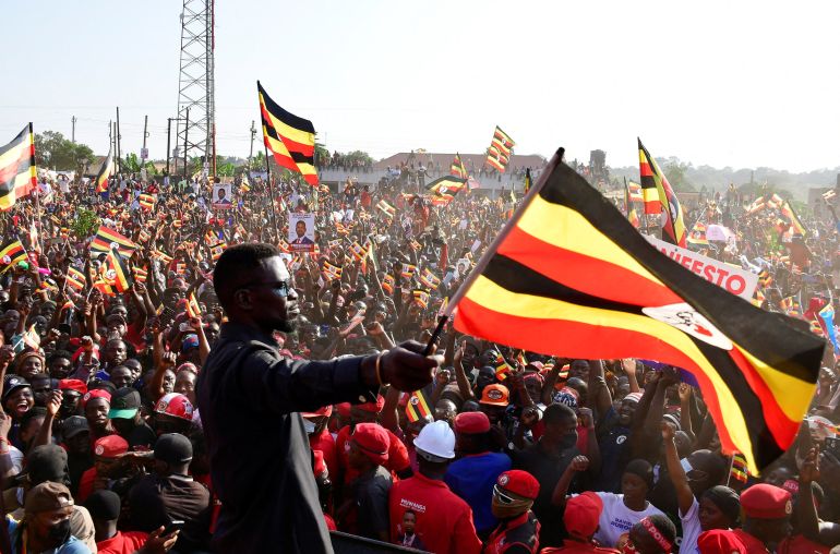 reuters_693291e2-1764921826 Ugandan Presidential candidate Robert Kyagulanyi, also known as Bobi Wine, of the National Unity Platform (NUP) party, addresses his supporters during a campaign rally ahead of the general elections in Kira Municipality, Wakiso district on the outskirts of Kampala, Uganda December 1, 2025. REUTERS/Abubaker Lubowa