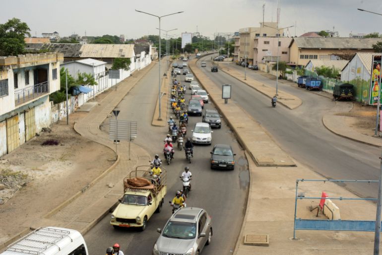 Traffic moves along a road, a day after the country's armed forces thwarted the attempted coup against the government of Benin's President Patrice Talon, in Cotonou, Benin, on December 8, 2025. REUTERS/Charles Placide Tossou TPX IMAGES OF THE DAY