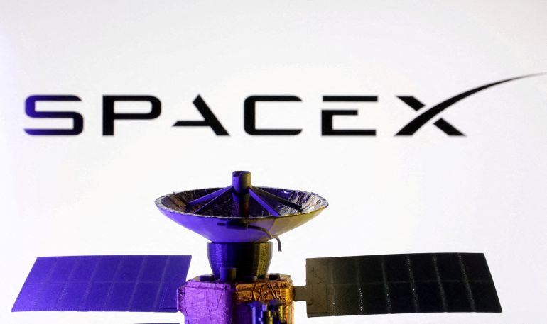 reuters_693d6d78-1765633400 FILE PHOTO: SpaceX logo and miniature satellite model are seen in this illustration created on March 10, 2025. REUTERS/Dado Ruvic/Illustration/File Photo/File Photo