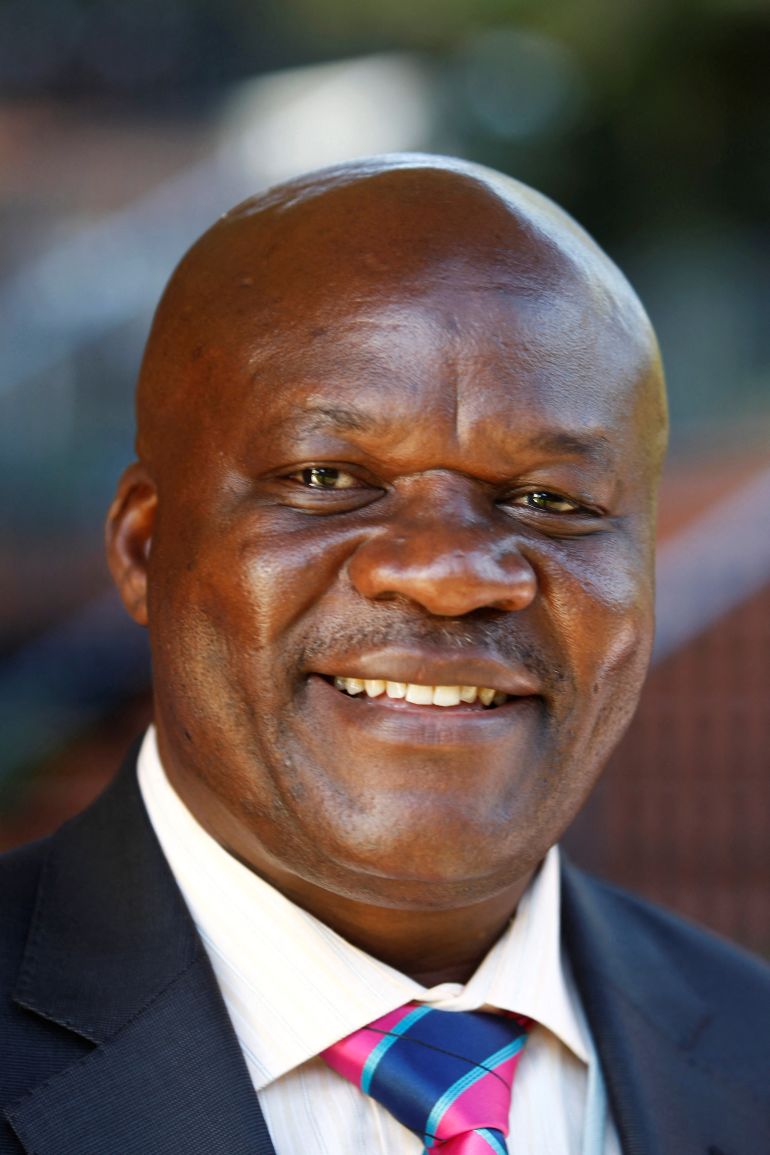 FILE PHOTO: Roger Lumbala, a former member of parliament in the Democratic Republic of Congo who joined the M23 rebel group, attends a peace talk meeting in Uganda's capital Kampala January 11, 2013, as the second round of peace negotiations resume between the M23 rebels and Congolese government. REUTERS/James Akena/File Photo