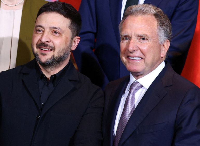 reuters_6948825c-1766359644-1 FILE PHOTO: Ukraine's President Volodymyr Zelenskiy and U.S. Special Envoy Steve Witkoff react during a family photo opportunity at the Chancellery in Berlin, Germany, December 15, 2025. REUTERS/Lisi Niesner/Pool/File Photo