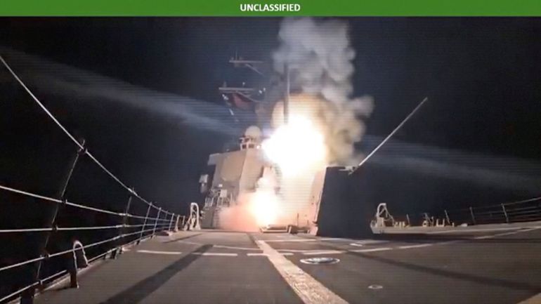 A missile is launched from a military vessel at an unidentified location, in this screen grab obtained from a handout video released by the Department of War on December 25, 2025. U.S. Department of War Via X/Handout via REUTERS THIS IMAGE HAS BEEN SUPPLIED BY A THIRD PARTY. TEXT OVERLAY FROM SOURCE. VERIFICATION LINES: Reuters was not able to independently verify the location or the date when the video was filmed.