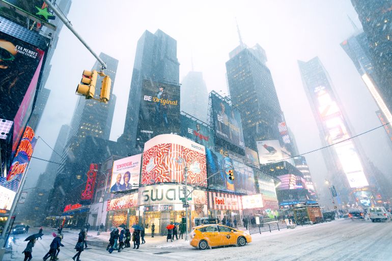 New York City - January 22, 2014: Snow weather in Manhattan Times Square