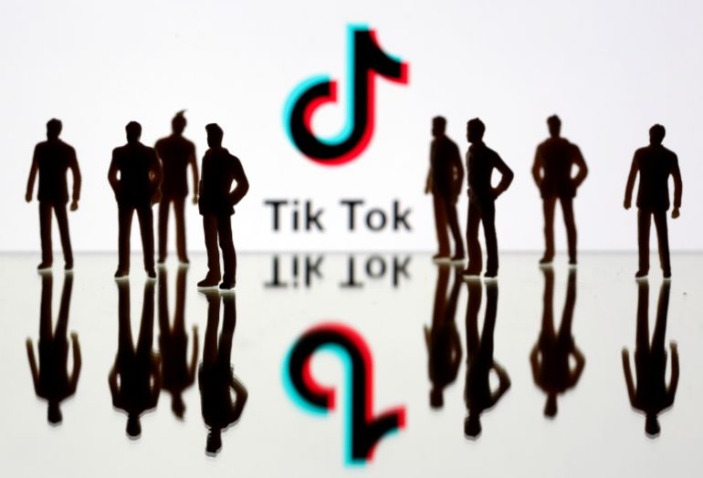 A 3-D printed figures are seen in front of displayed Tik Tok logo in this picture illustration taken November 7, 2019. Picture taken November 7, 2019. REUTERS/Dado Ruvic/Illustration
