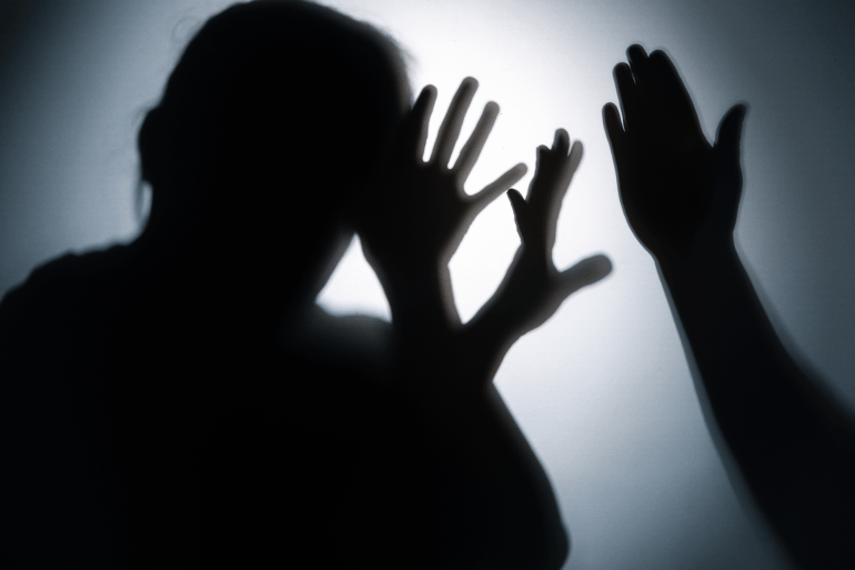 16816198-1769425967 Silhouettes of quarreling parents on white background. Domestic violence concept