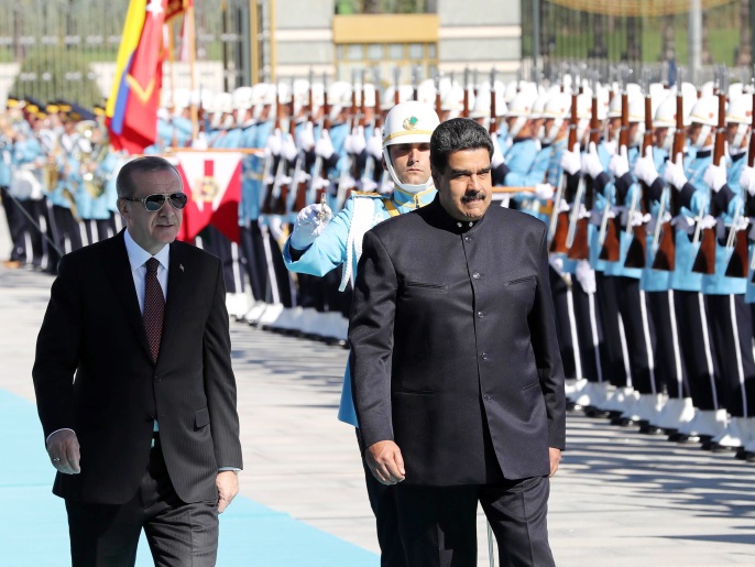 3a23c1b7-0510-4a8b-ad86-c015e56ddb3f Venezuelan President Nicolas Maduro (R) and Turkish President Recep Tayyip Erdogan walk past honor guard during an official welcome ceremony, at Presidential Complex in Ankara, on October 6, 2017. / AFP PHOTO / ADEM ALTAN (Photo credit should read ADEM ALTAN/AFP/Getty Images)